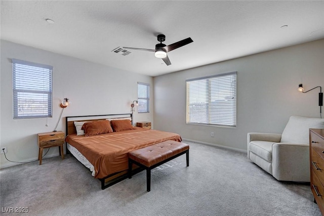 bedroom featuring ceiling fan and light colored carpet