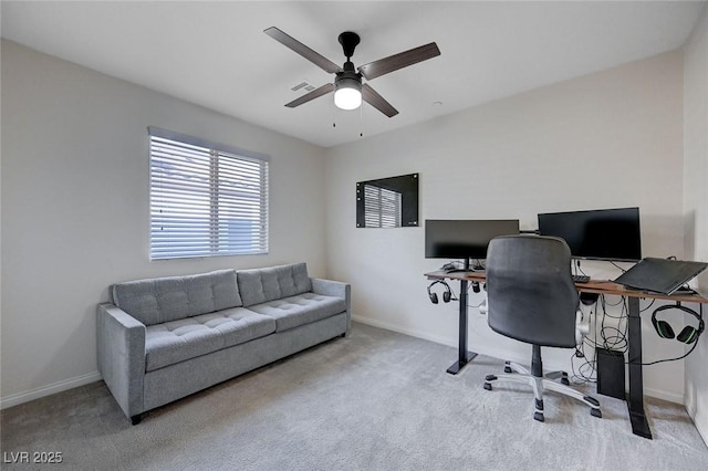 office featuring light carpet and ceiling fan