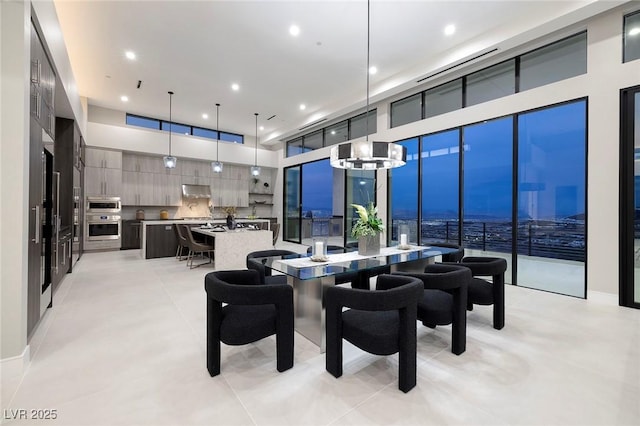 dining space with a high ceiling