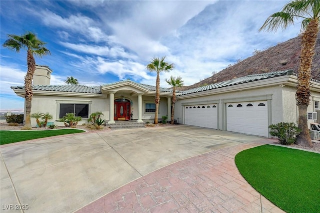 view of front of house with a garage