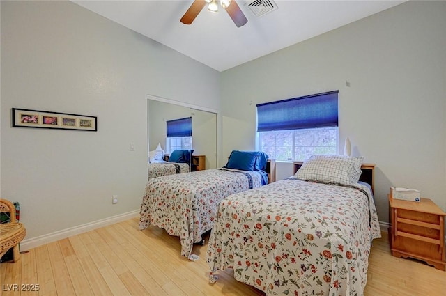 bedroom with hardwood / wood-style flooring and ceiling fan