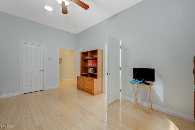 interior space with ceiling fan and light wood-type flooring