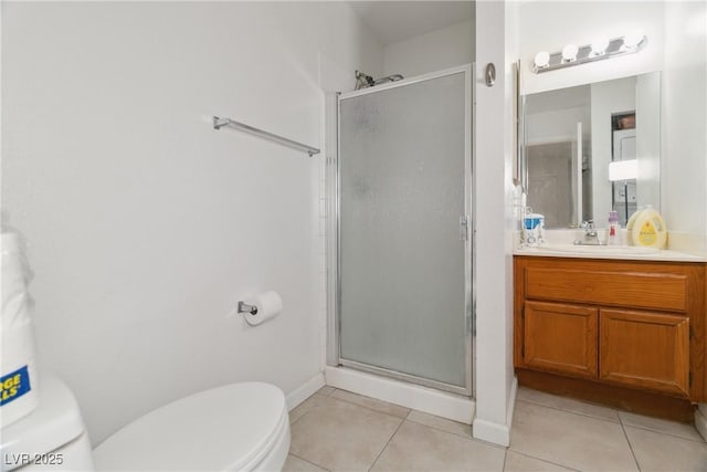 bathroom featuring walk in shower, toilet, and tile patterned flooring