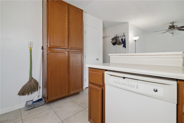 kitchen with dishwasher, light tile patterned floors, and ceiling fan