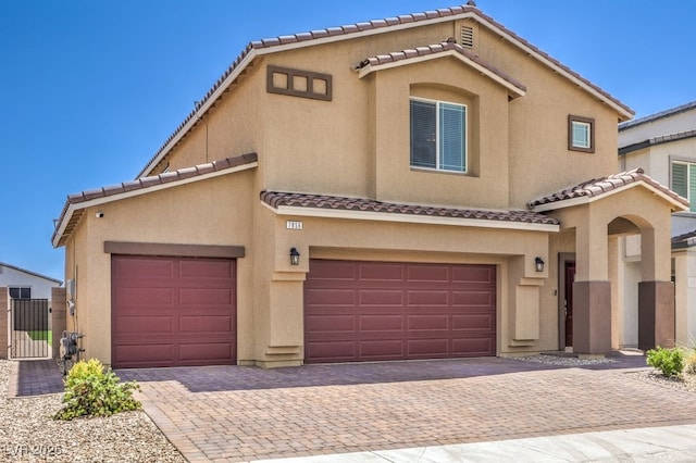 view of front of property with a garage