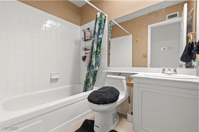 bathroom with visible vents, shower / tub combo with curtain, vanity, and toilet