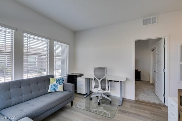 office area featuring light wood-type flooring