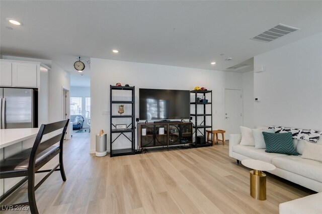 living room featuring light wood-type flooring