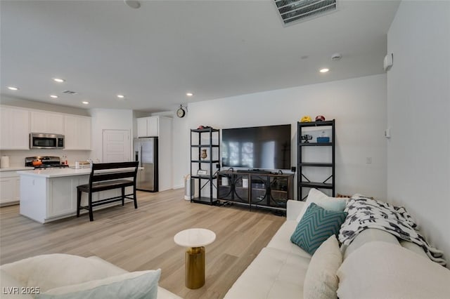 living room with light wood-type flooring