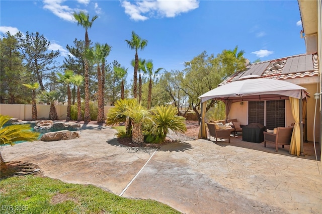 view of patio / terrace featuring a gazebo and outdoor lounge area