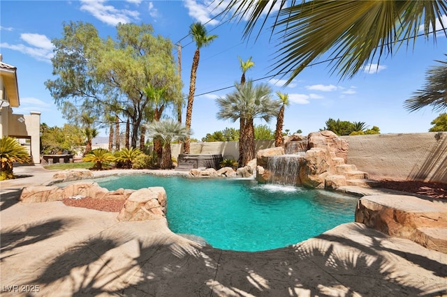 view of pool featuring a hot tub