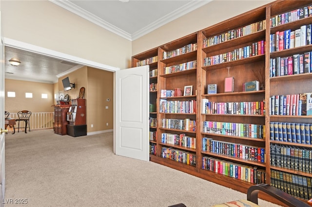 living area with light colored carpet and ornamental molding