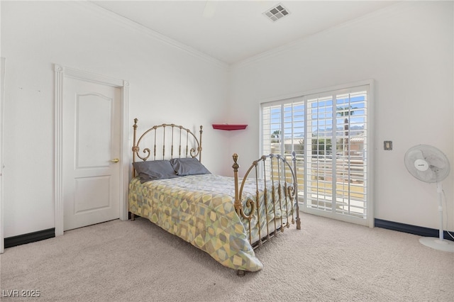 bedroom featuring ornamental molding, carpet flooring, and access to exterior