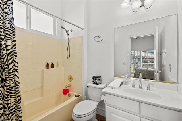 full bathroom with vanity, toilet, and shower / bath combo