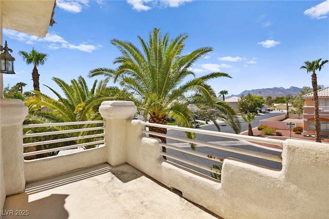 balcony featuring a mountain view