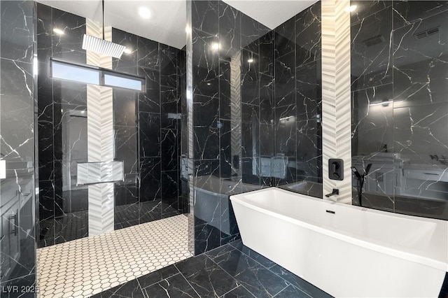 bathroom with independent shower and bath and tile walls