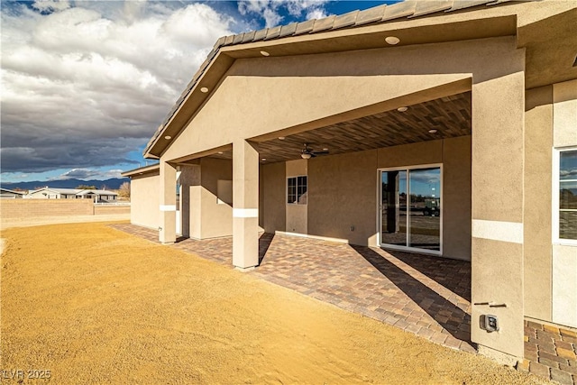 view of patio / terrace with ceiling fan