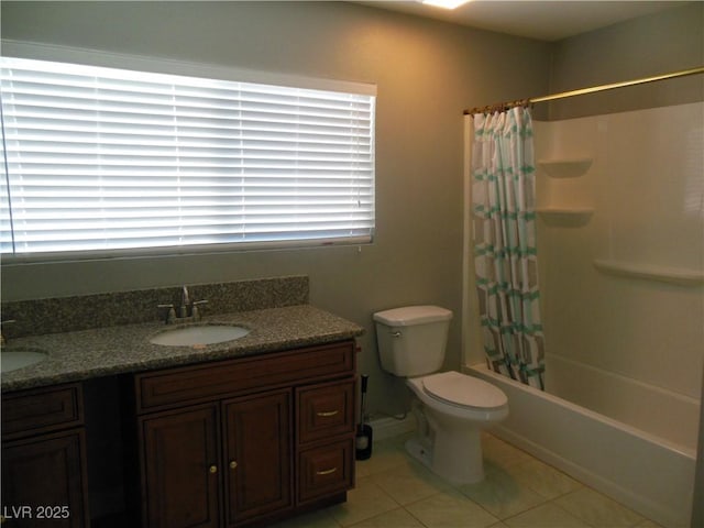 full bathroom featuring vanity, shower / tub combo, tile patterned floors, and toilet