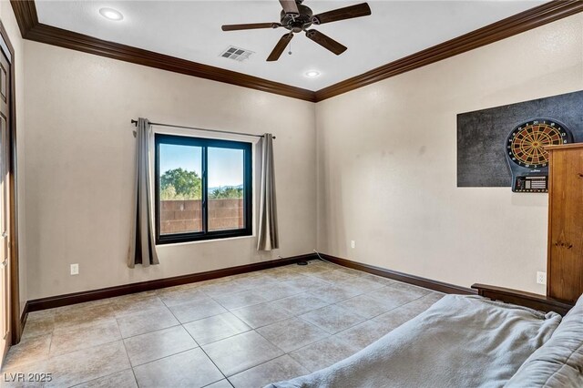 spare room with light tile patterned floors, ornamental molding, and ceiling fan