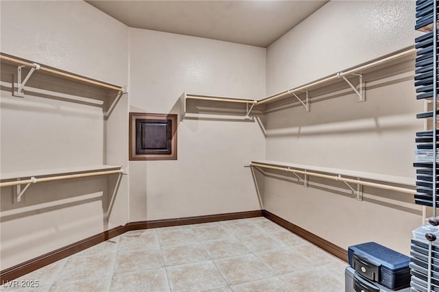 walk in closet featuring tile patterned floors