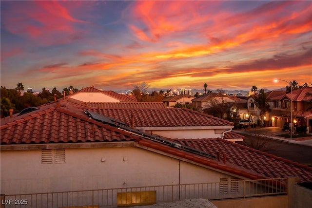 view of property exterior at dusk