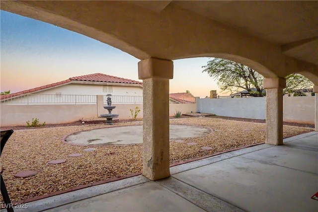 view of yard with a patio area and a fenced backyard