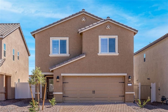 view of front of home with a garage