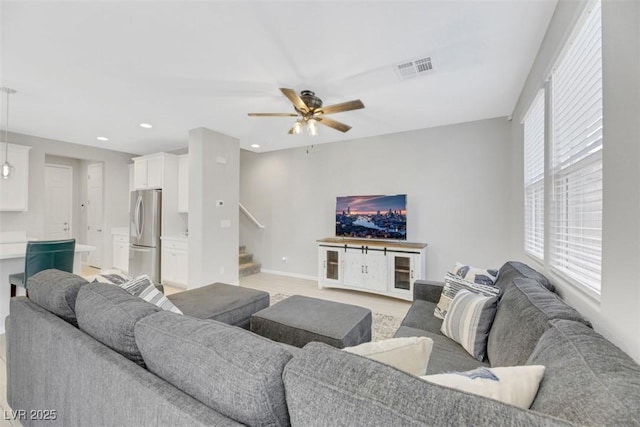 living room with ceiling fan