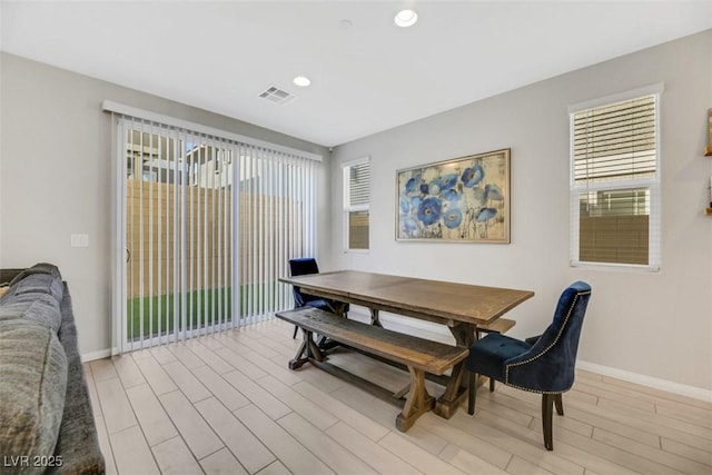 dining room with light wood-type flooring