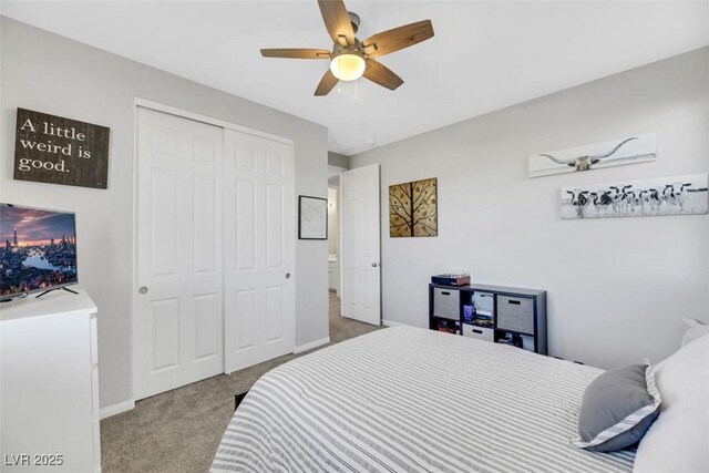 bedroom with light carpet, a closet, and ceiling fan