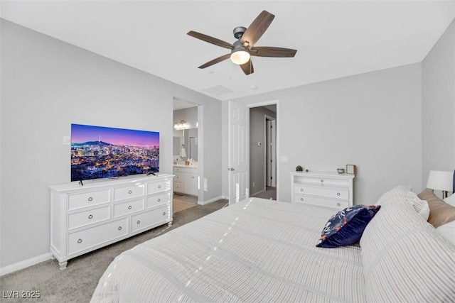 carpeted bedroom featuring ceiling fan and connected bathroom