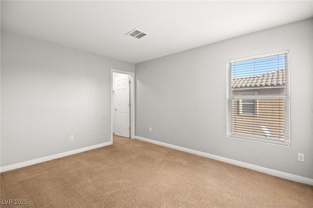 view of carpeted spare room