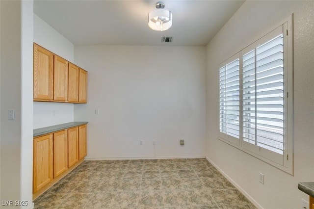 view of unfurnished dining area