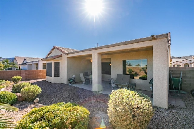 rear view of house featuring a patio area