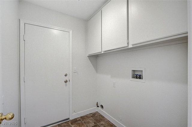 laundry room featuring hookup for a washing machine and cabinets