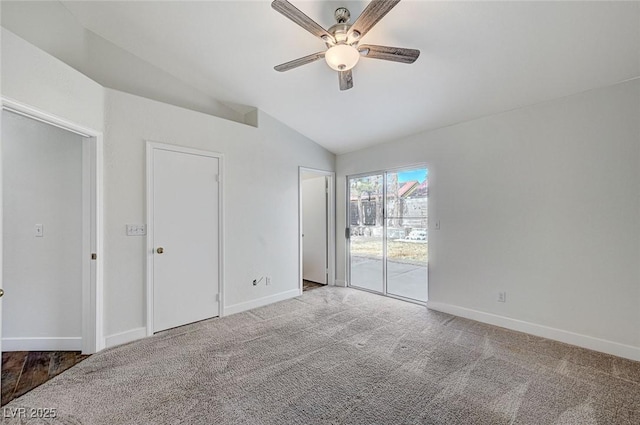 unfurnished bedroom featuring lofted ceiling, carpet floors, access to exterior, and ceiling fan