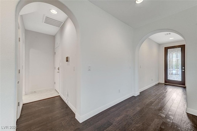 entryway featuring dark wood-type flooring