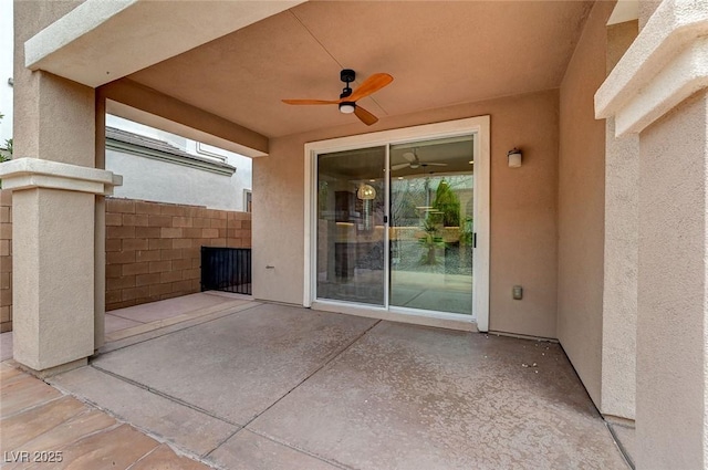 view of patio / terrace featuring ceiling fan