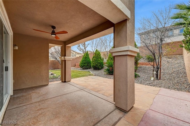 view of patio featuring ceiling fan