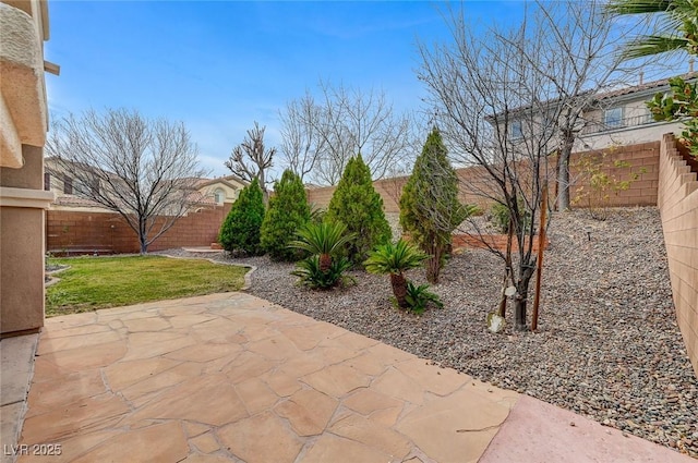 view of patio with a fenced backyard