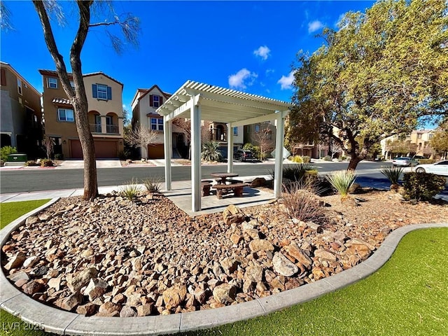 exterior space with a pergola