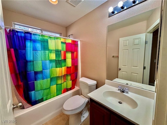 full bathroom featuring vanity, shower / bath combination with curtain, and toilet