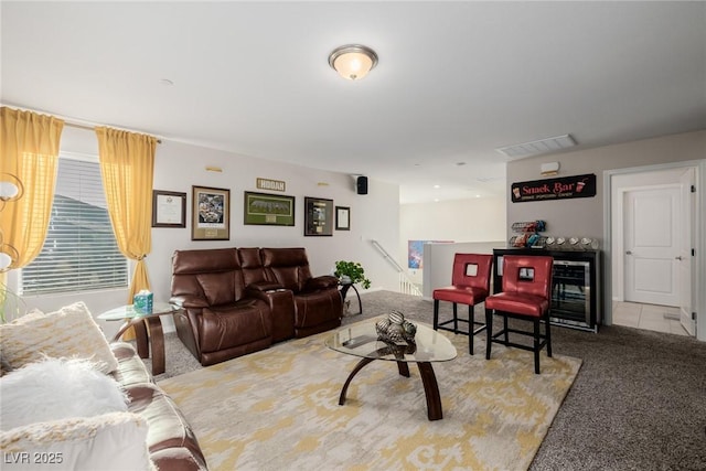 carpeted living room with wine cooler