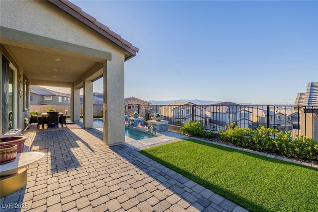 view of patio featuring a mountain view