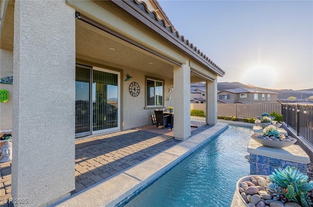 view of pool with a patio