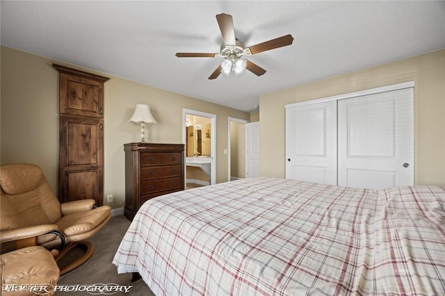 bedroom featuring ceiling fan, a closet, and dark colored carpet