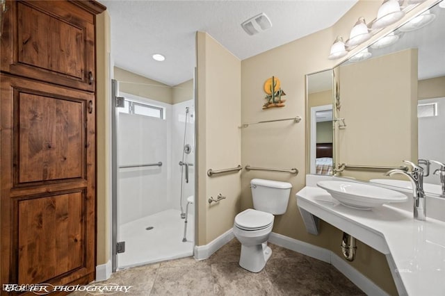 bathroom with lofted ceiling, tile patterned floors, toilet, an enclosed shower, and sink