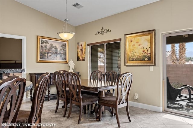 dining room featuring light tile patterned floors