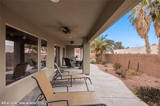 view of patio with ceiling fan