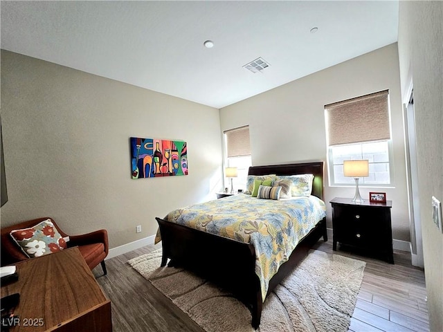 bedroom featuring light wood-type flooring